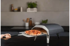 Ooni Pizzaschep Geperforeerd - Perforated Pizza Peel 14 Inch 5 Ooni Pizzaschep Geperforeerd - Perforated Pizza Peel 14 Inch -Barbecue Benodigdheden Winkel ooni pizzaschep geperforeerd perforated pizza peel 1
